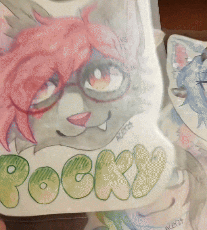 Gif showing watercolor badges and holographic laminate Gif showing watercolor badges and holographic laminate