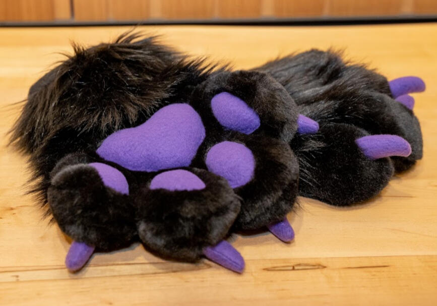 black and purple fursuit paws
