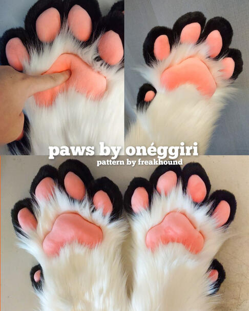 black and white fursuit paws