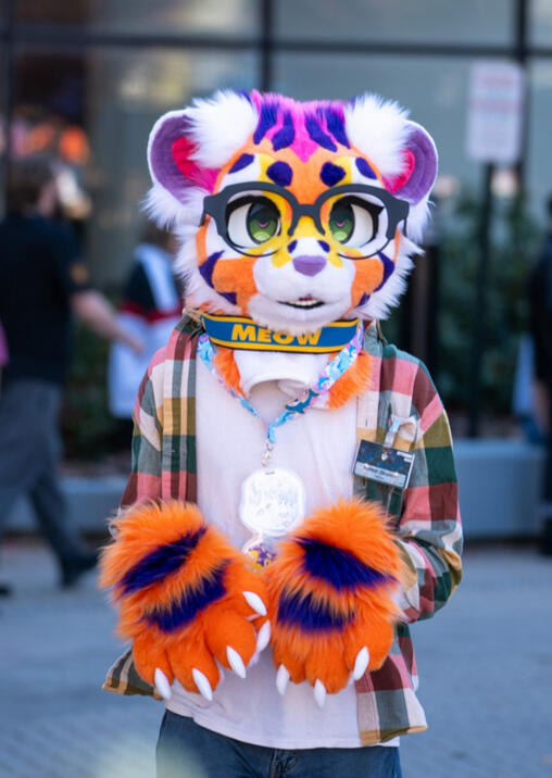 Lisa Frank Tiger Fursuit (Megaplex 2024 Premade; Photo credits: ToastIsADog) Lisa Frank Tiger Fursuit (Megaplex 2024 Premade; Photo credits: ToastIsADog)